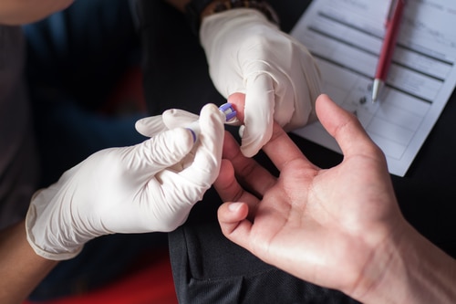 Finger stick blood draw for health screening